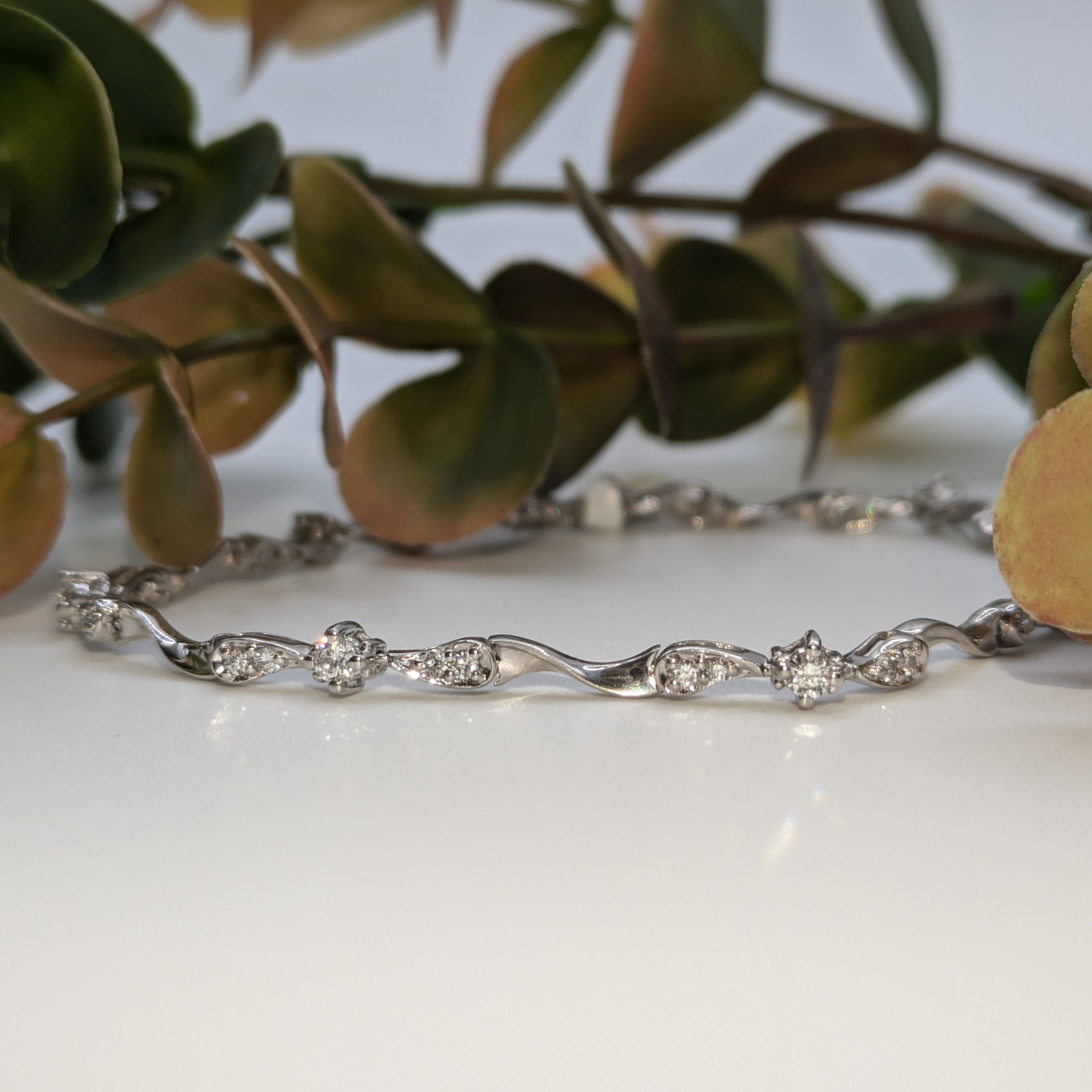 Twited design style white gold diamond cluster bracelet