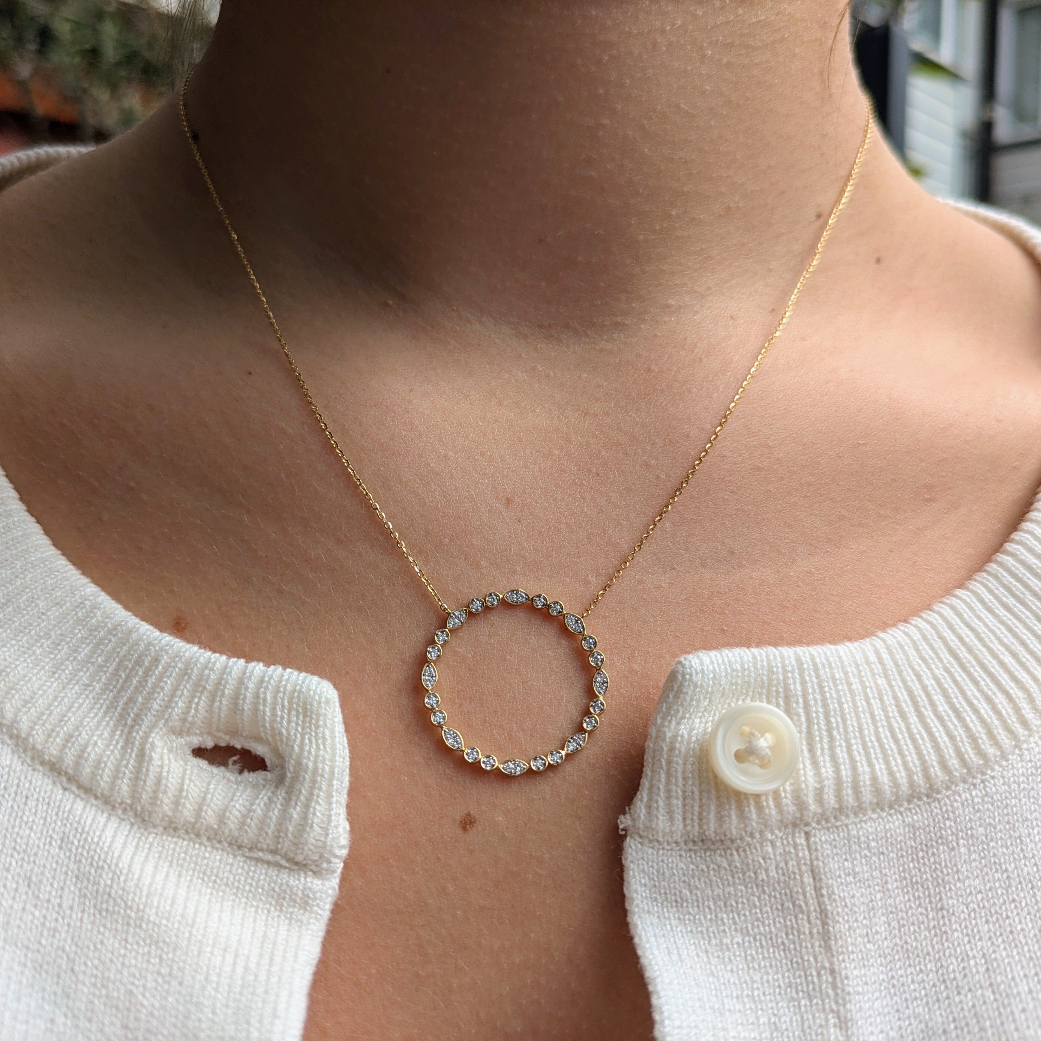 marquise and round style milgrain open cycle 18k yellow gold