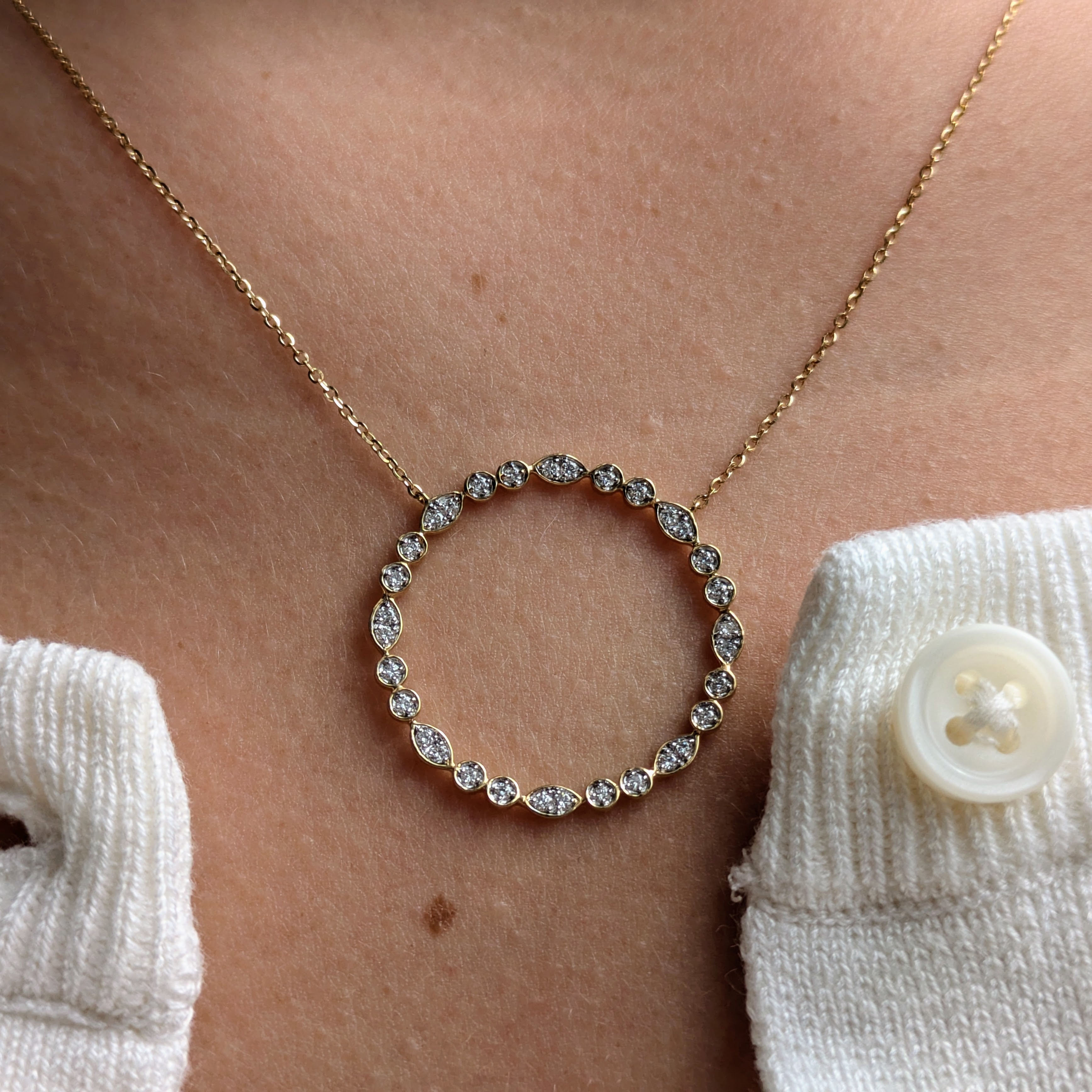 marquise and round style milgrain open cycle 18k yellow gold