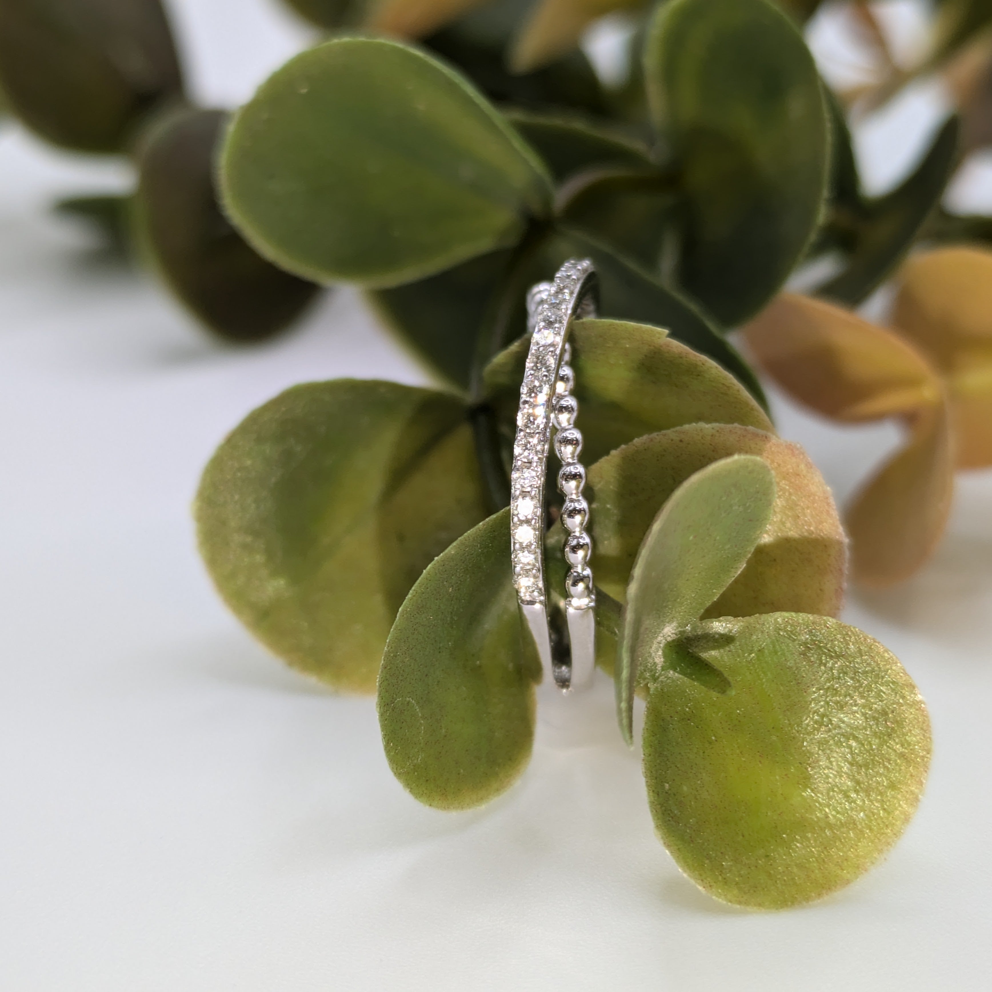 18k Crossover bands one beaded one half eternity style