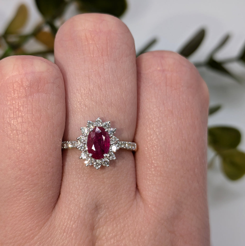 Ruby ring with flower style halo