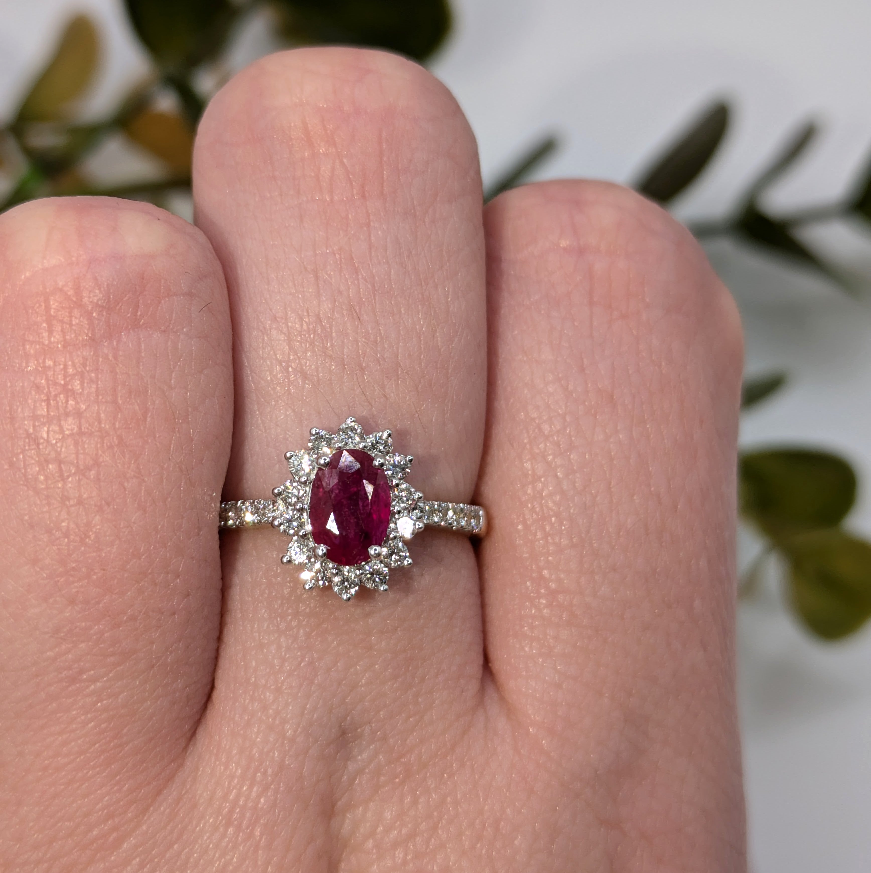 Ruby ring with flower style halo