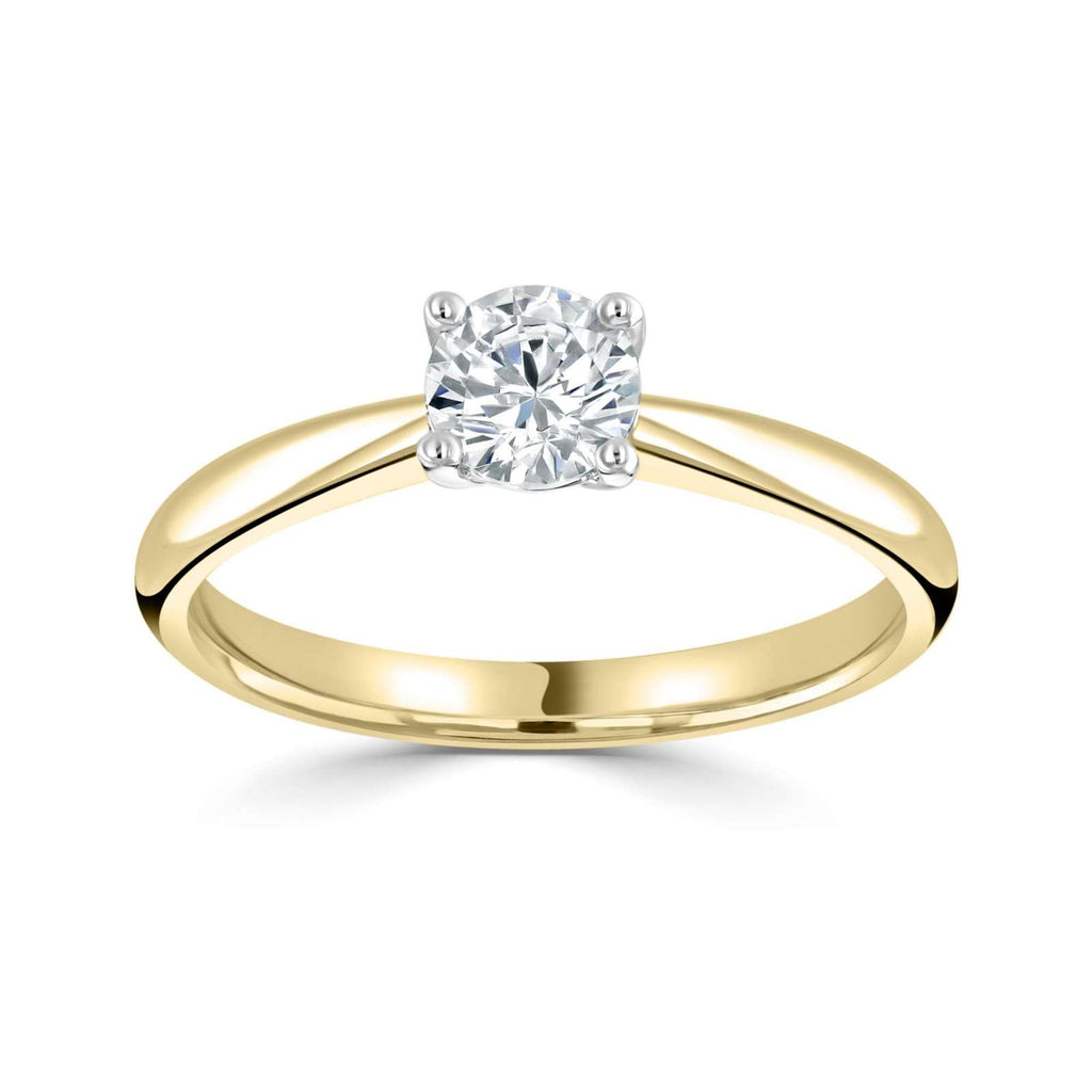 0.60ct Round solitaire on 18K yellow gold band F/VS2